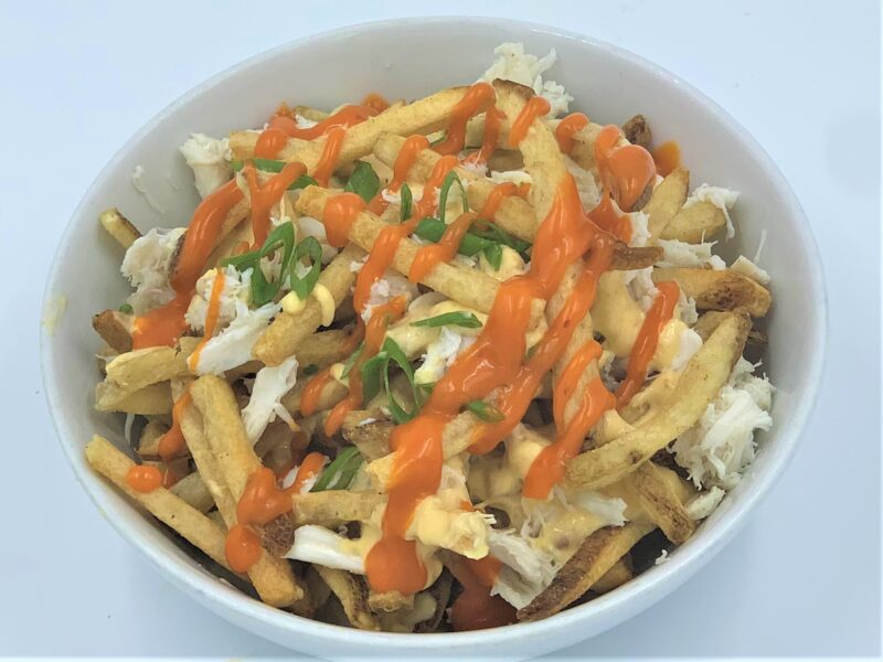 Crab Fries with Chorizo, Beer & Cheese Sauce Newport International