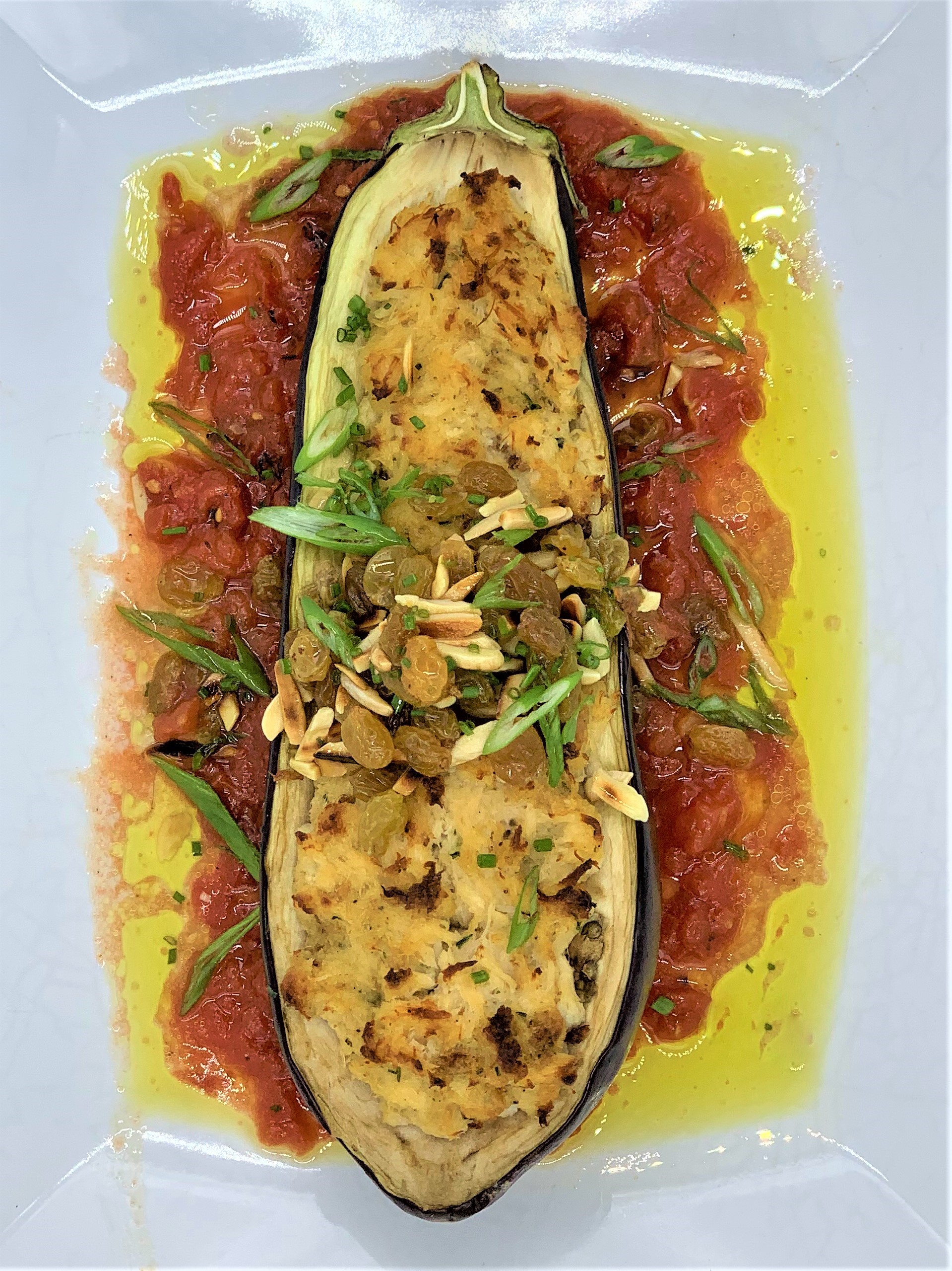 Crab Cake Stuffed Eggplant with Roasted Tomato Sauce and Almond and